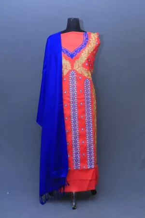 Dark Pink Colour Suit With Blue Colour Stole Along With Attractive Embroidery Gives Royal Look.